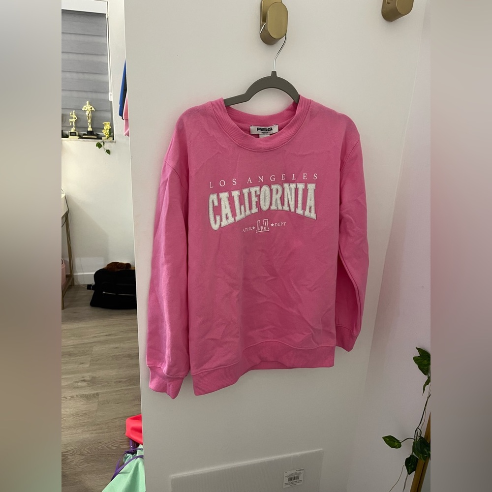 pink crewneck sweatshirt